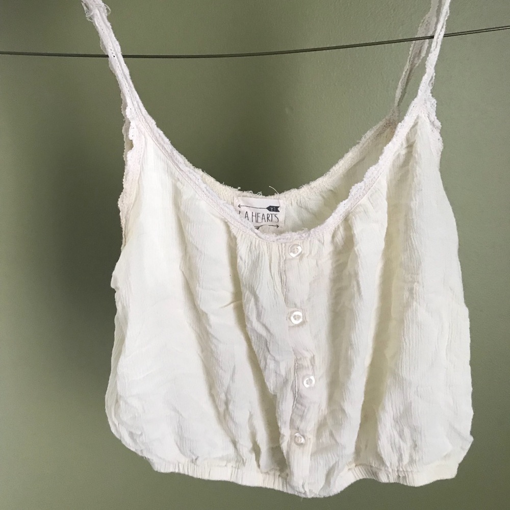 Cute little white and lace crop top. Small-medium